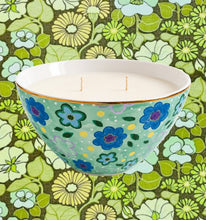 Load image into Gallery viewer, Decorative candle in a floral-patterned bowl on a floral fabric background
